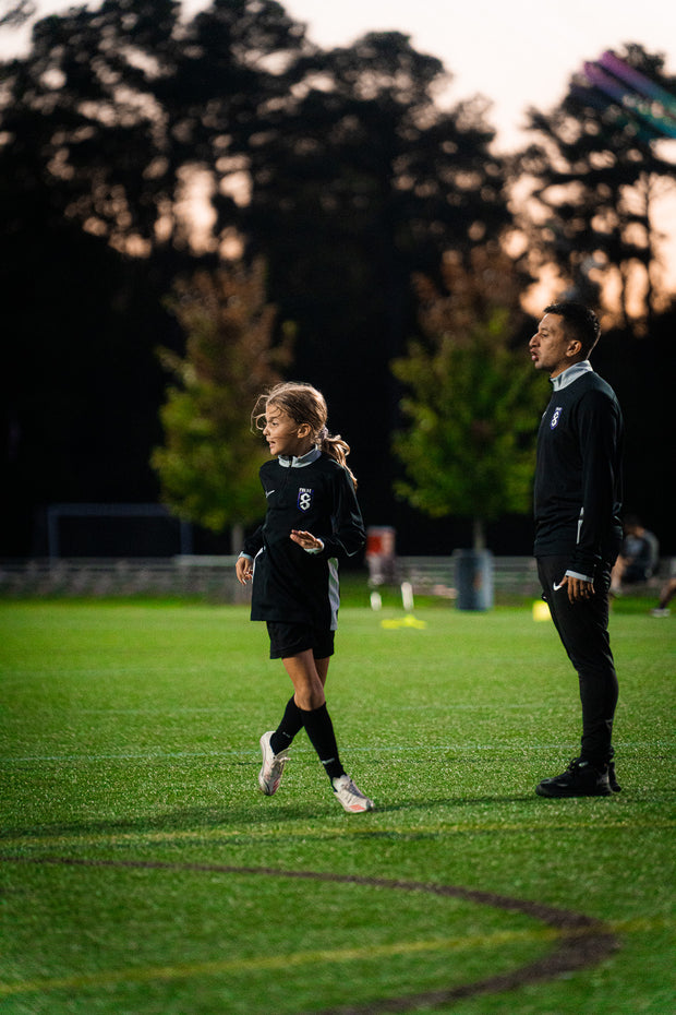Official False 8 Academy Nike Drill Top 2025